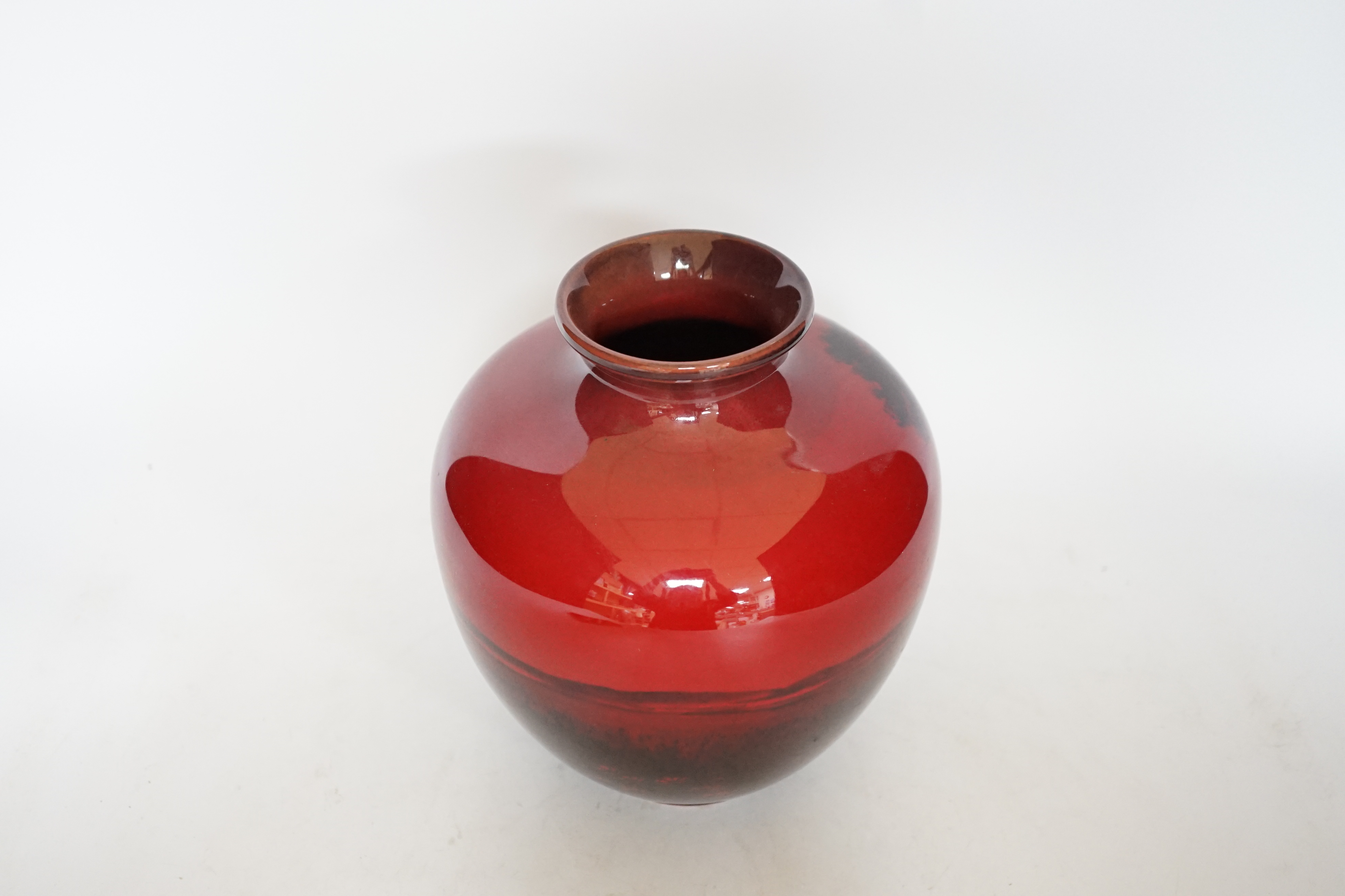 A Royal Doulton red and black flambé vase, 19cm high